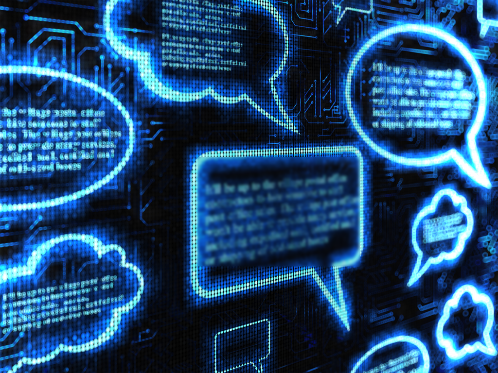 Digital speech bubbles appearing on a computer screen