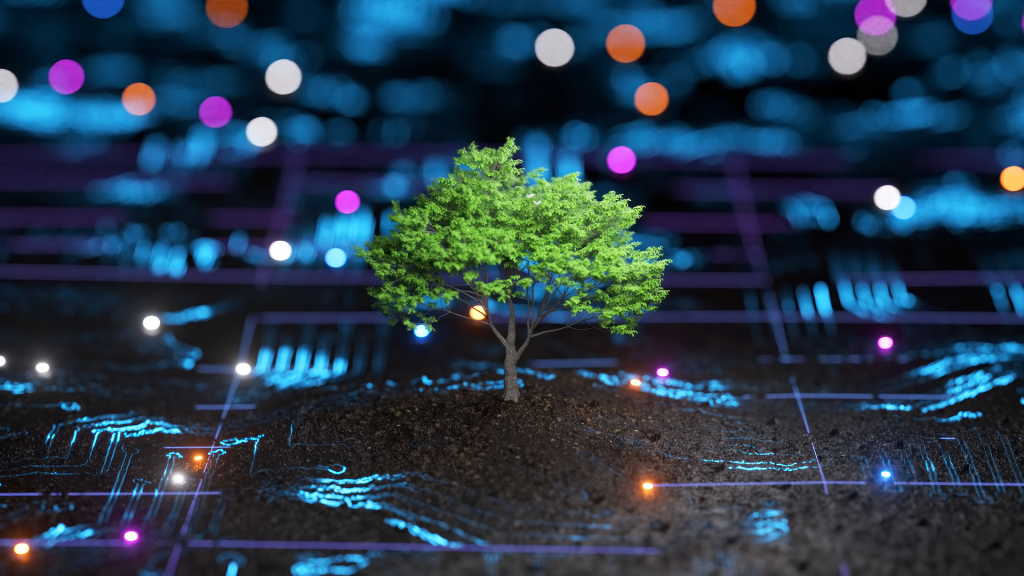 A miniature tree growing up out of a microchip board