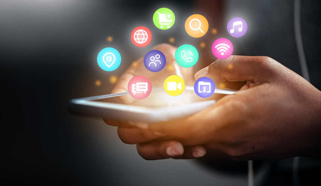 Close up of a mobile phone with colourful circular symbols coming out from the screen